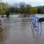 How to report flooding concerns near the Otley riverside