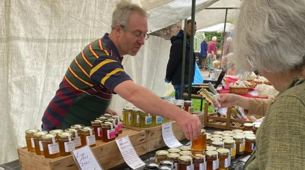 Where can visitors find local market stalls in Headingley